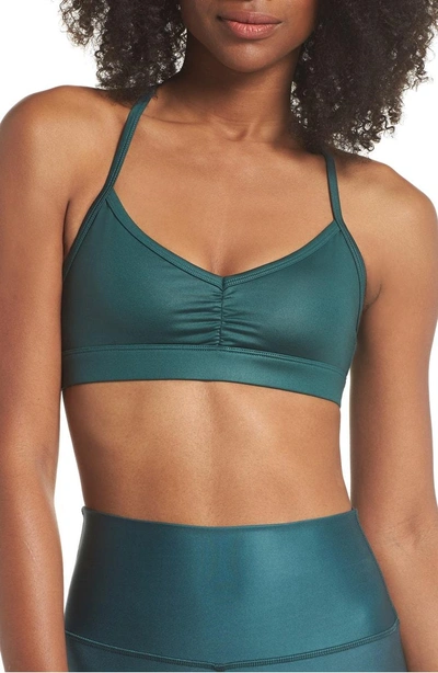 Shop Alo Yoga 'sunny Strappy' Soft Cup Bralette In Tourmaline Glossy