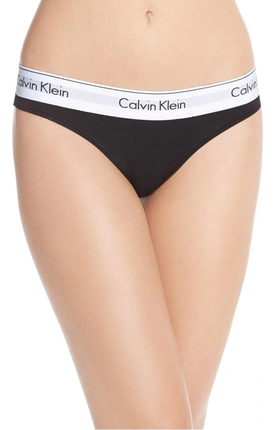 Shop Calvin Klein Logo Thong In Black