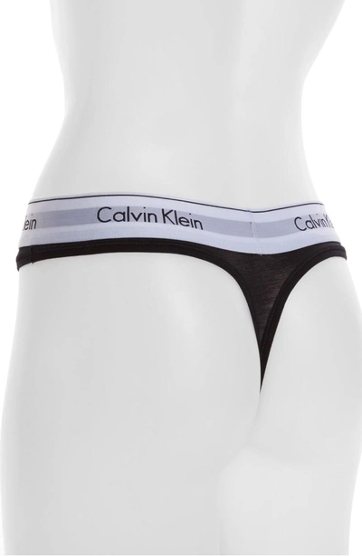 Shop Calvin Klein Logo Thong In Black