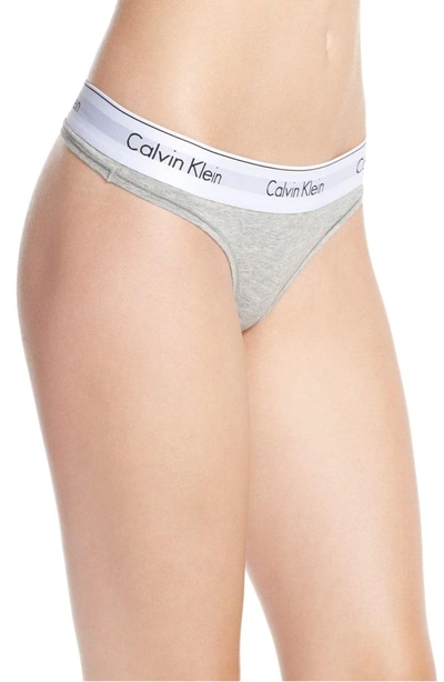 Shop Calvin Klein Logo Thong In Heather Grey