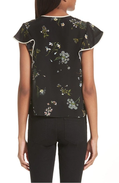 Shop Red Valentino Floral Print Ruffle Neck Silk Blouse In Nero