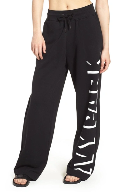 Shop Ivy Park Shadow Logo Sweatpants In Black