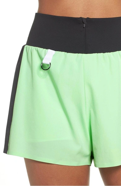 Shop Nike Dri-fit Running Shorts In Vapor Green/ Black/ White