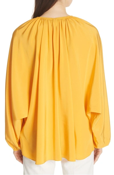 Shop Elizabeth And James Chance Tie Neck Silk Top In Saffron