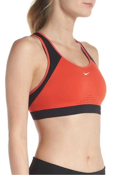 Shop Nike Motion Adapt Sports Bra In Habanero Red/ Black/ White