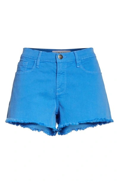 Shop Frame Le Cutoff Denim Shorts In Coastal Blue