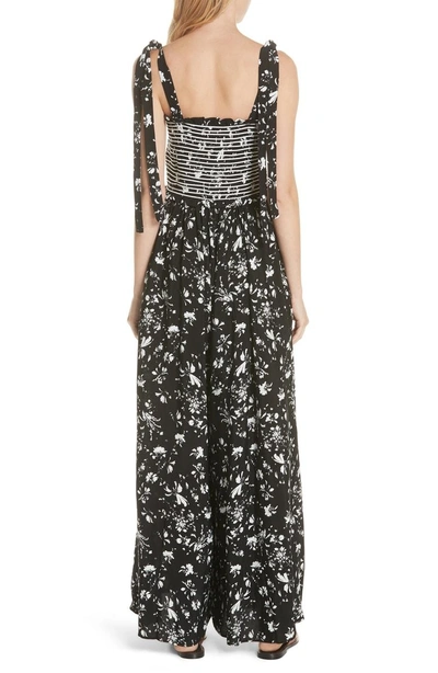 Shop Free People Color My World Floral Jumpsuit In Black