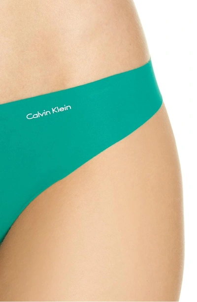 Shop Calvin Klein 'invisibles' Thong In Simmer Green
