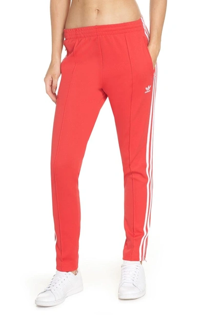 Shop Adidas Originals Sst Track Pants In Radiant Red