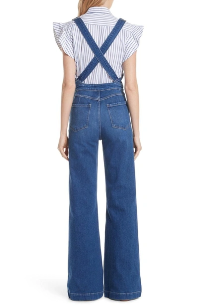 Shop Frame Palazzo Wide Leg Denim Overalls In Longwater