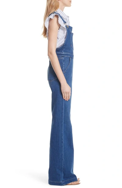 Shop Frame Palazzo Wide Leg Denim Overalls In Longwater
