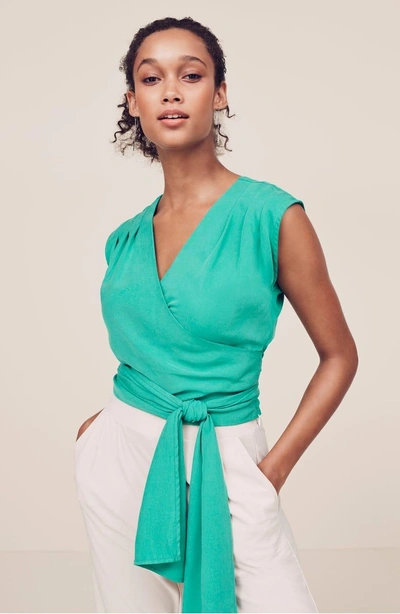 Shop Joa Wide Strap Wrap Top In Green