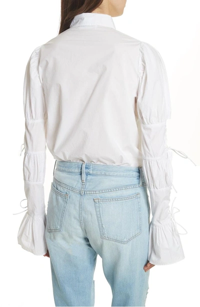 Shop Frame Lace-up Sleeve Cotton Shirt In Blanc