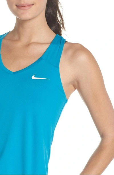 Shop Nike 'pure' Dri-fit Racerback Tank In Neo Turquoise/ White
