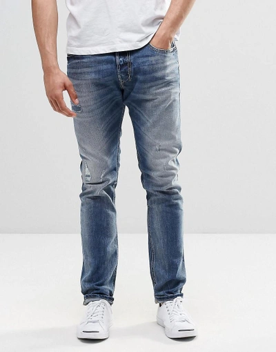 Shop Diesel Tepphar Skinny Jeans 853y Mid Distressed Repair Wash - Blue