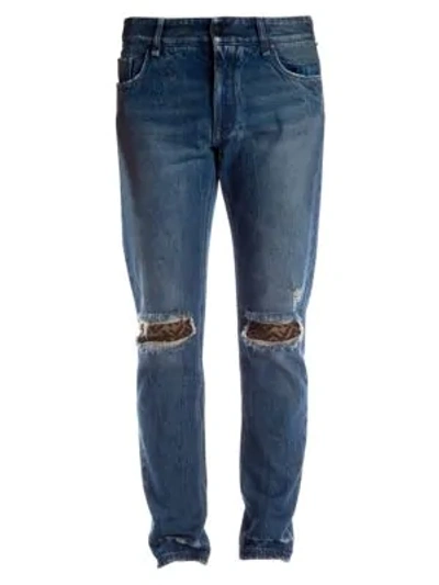 Shop Fendi Distressed Logo Patch Skinny Jeans In Indigo