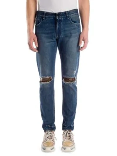 Shop Fendi Distressed Logo Patch Skinny Jeans In Indigo