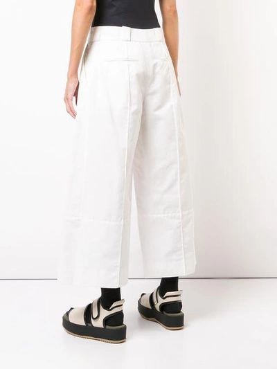 Shop Marni Cropped Flared Trousers - White