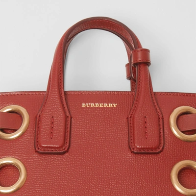 Shop Burberry The Baby Banner In Grommeted Leather In Crimson
