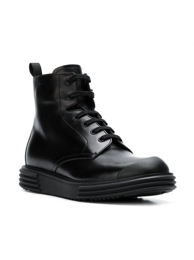 Shop Prada Lug Sole Ankle Boots - Black