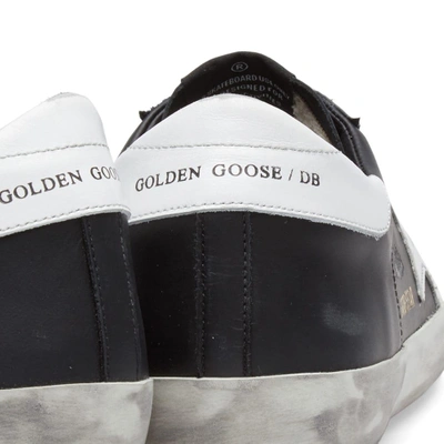 Shop Golden Goose Deluxe Brand Superstar Leather Sneaker In Black