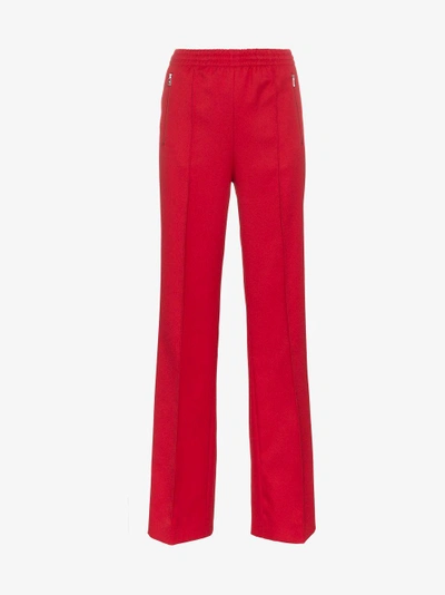 Shop Prada Logo Patch Zip Pocket Track Pants In Red