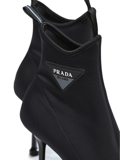 Shop Prada Logo Patch Boots In Nero
