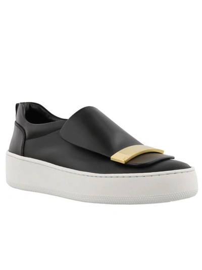 Shop Sergio Rossi Sr1 Slip On In Black/ Gold/ White