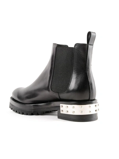 Shop Alexander Mcqueen Flat Ankle Boots In Black