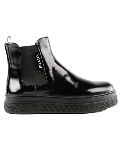 Shop Prada Spazzolato Ankle Boots In Nero