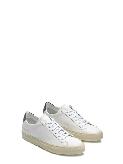 Shop Common Projects Common Project Achilles Retro Low Sneakers In Bianco Nero