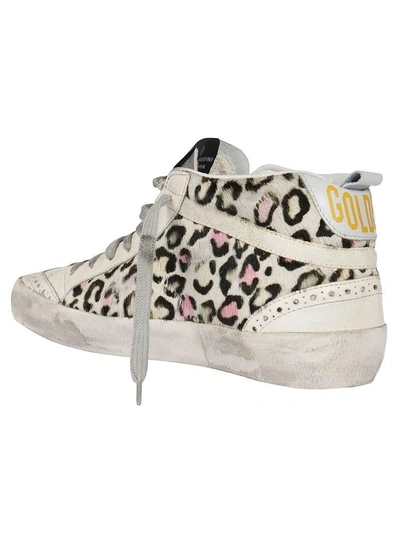 Shop Golden Goose Mid Star Sneakers