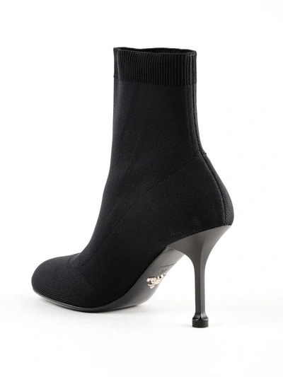 Shop Prada Logo Sock Ankle Boots In Nero