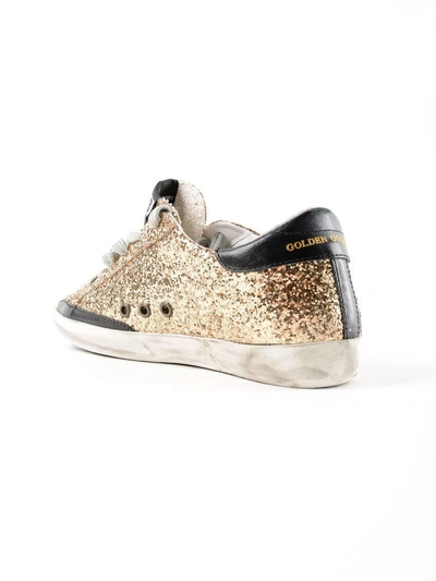 Shop Golden Goose Superstar Glittered Flag Sneakers In Gold