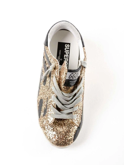 Shop Golden Goose Superstar Glittered Flag Sneakers In Gold