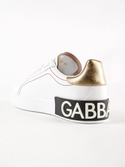 Shop Dolce & Gabbana Logo Back Sole Sneakers In Bianco/oro