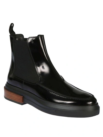 Shop Tod's Leather Ankle Boots In Nero