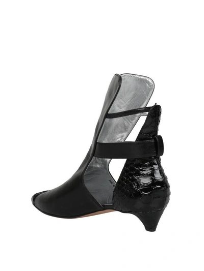 Shop Givenchy Leather And Python Boots In Nero