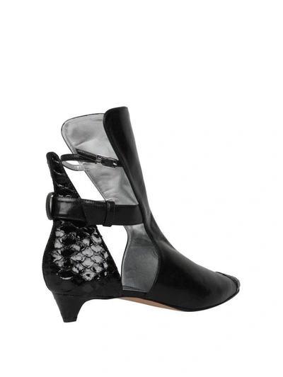 Shop Givenchy Leather And Python Boots In Nero