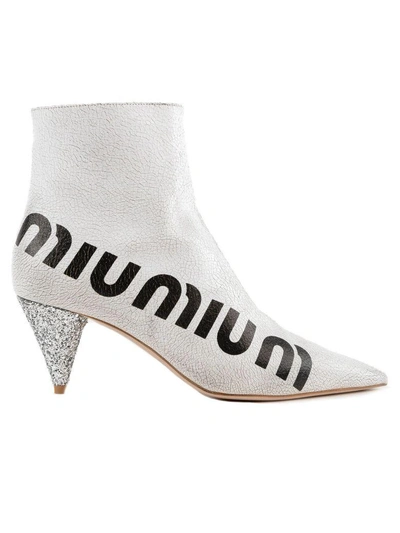 Shop Miu Miu Crackle Logo Ankle Boots In G3z Bianco/nero