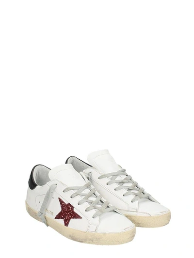 Shop Golden Goose Superstar White Leather Sneakers