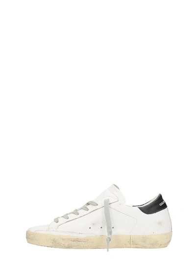 Shop Golden Goose Superstar White Leather Sneakers