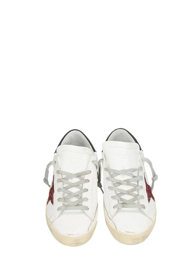 Shop Golden Goose Superstar White Leather Sneakers