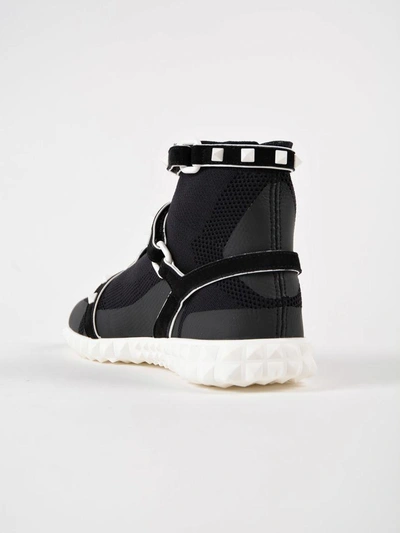 Shop Valentino Rockstud Slip-on Sneakers In 0vp Nero-bianco