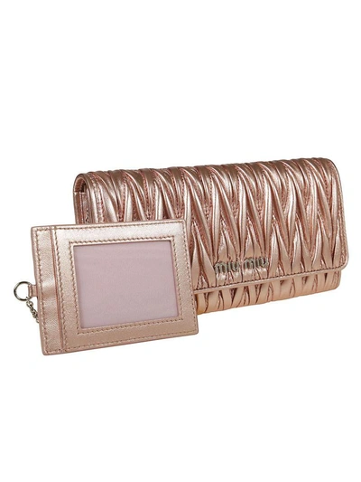 Shop Miu Miu Quilted Continental Wallet In Pink