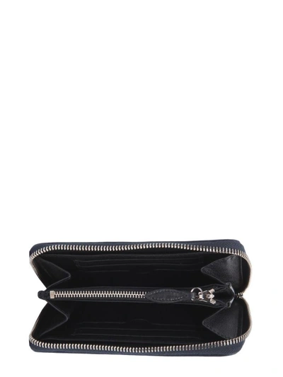 Shop Alexander Mcqueen Medium Zip Around Wallet In Blu