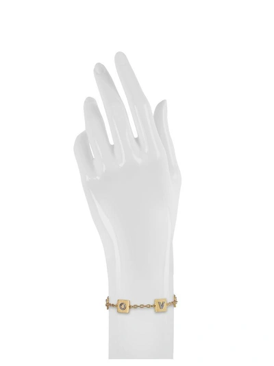 Shop Tory Burch Love Message Delicate Chain Bracelet In Gold