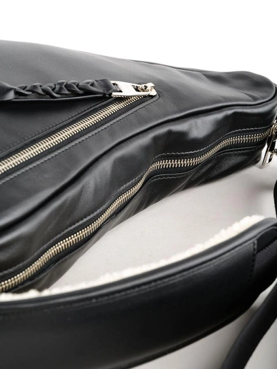 Shop Alexander Mcqueen Zipped Shoulder Bag In Black/tan