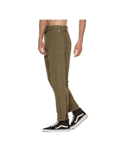 Shop Jw Anderson Dyed Army Trousers In Green