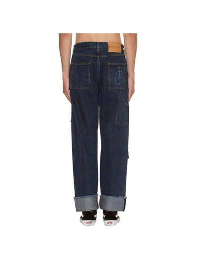 Shop Jw Anderson Multi Pocket Jeans In Blue